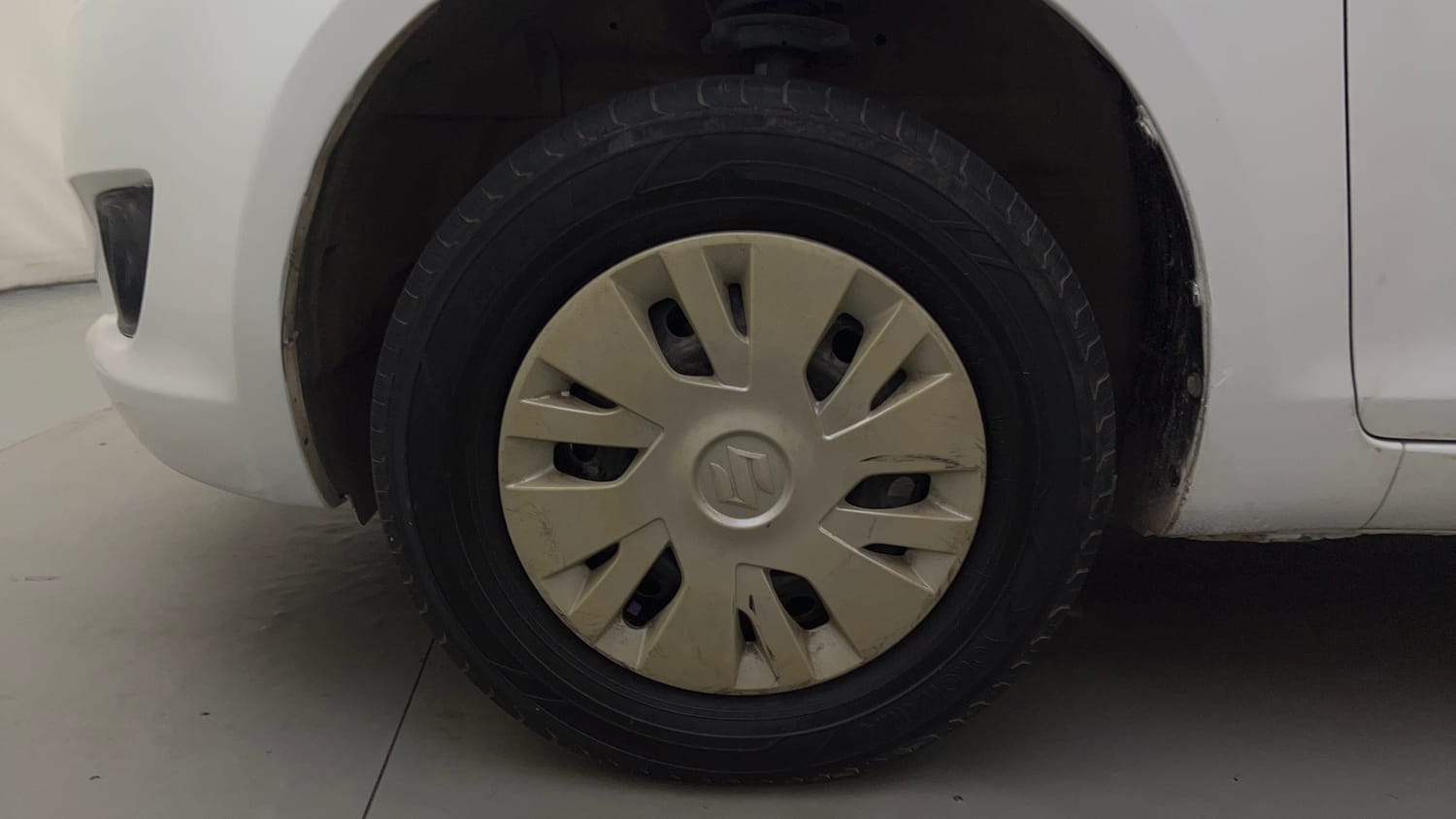 Used 2012 Maruti Suzuki Swift VXi Petrol Manual tyres LEFT FRONT TYRE RIM VIEW