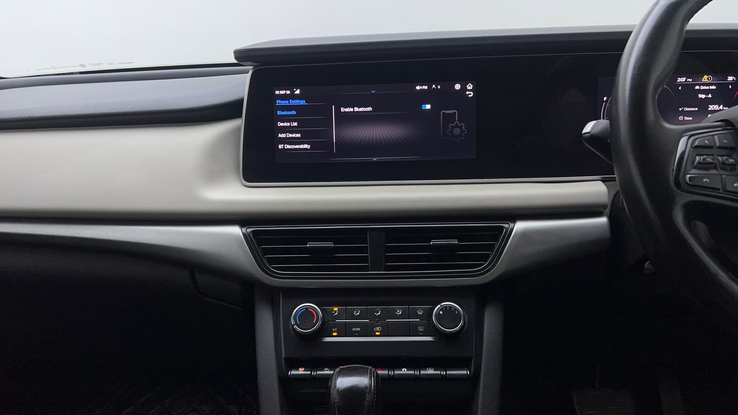 Used 2022 Mahindra XUV700 AX 3 Petrol AT 5 STR Petrol Automatic interior MUSIC SYSTEM & AC CONTROL VIEW