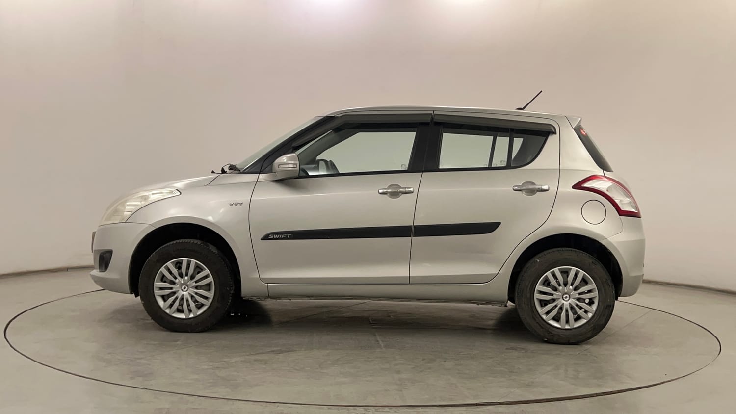 Used 2013 Maruti Suzuki Swift VXi Petrol Manual exterior LEFT SIDE VIEW