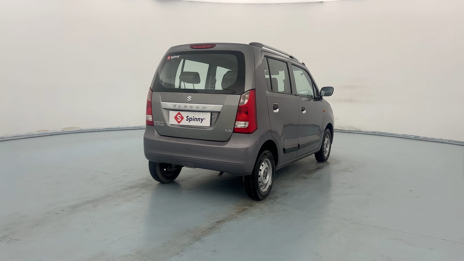 Used 2015 Maruti Suzuki Wagon R LXI Petrol Manual exterior LEFT REAR CORNER VIEW