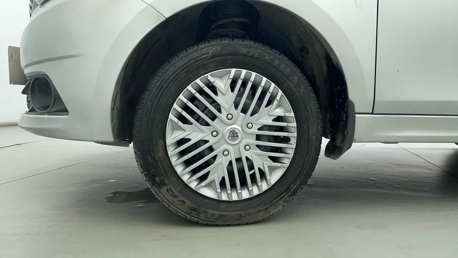 Used 2016 Tata Tiago Revotron XT Petrol Manual tyres LEFT FRONT TYRE RIM VIEW