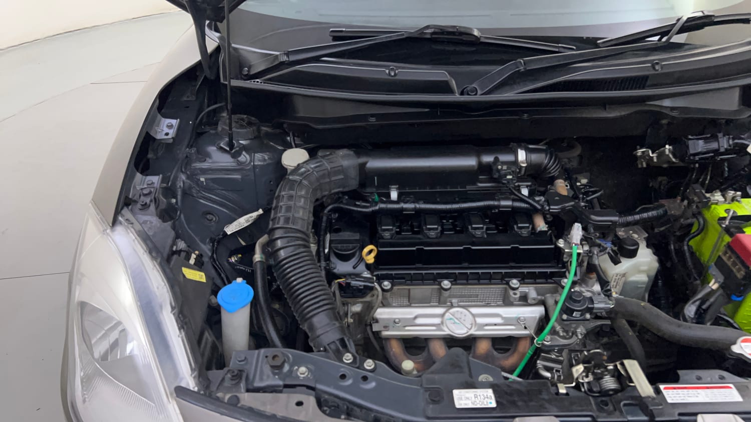 Used 2022 Maruti Suzuki Swift VXi AMT Petrol Automatic engine ENGINE RIGHT SIDE HINGE & APRON VIEW