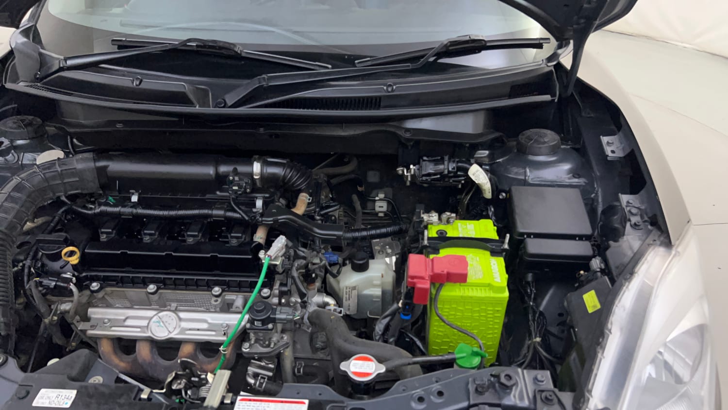 Used 2022 Maruti Suzuki Swift VXi AMT Petrol Automatic engine ENGINE LEFT SIDE HINGE & APRON VIEW