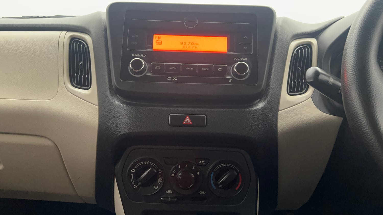 Used 2022 Maruti Suzuki Wagon R VXI 1.0 Petrol Manual top_features Integrated (in-dash) music system