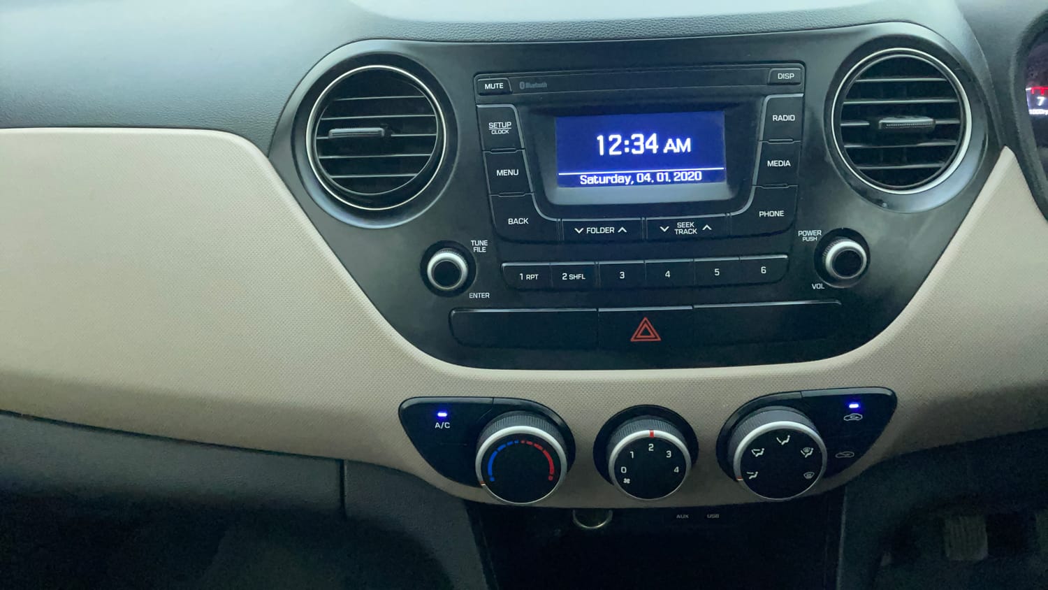 Used 2018 Hyundai Grand i10 Magna 1.2 Kappa VTVT Petrol Manual interior MUSIC SYSTEM & AC CONTROL VIEW