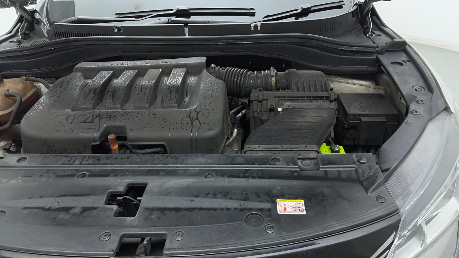 Used 2022 Mahindra XUV700 AX 3 Petrol AT 5 STR Petrol Automatic engine ENGINE LEFT SIDE VIEW