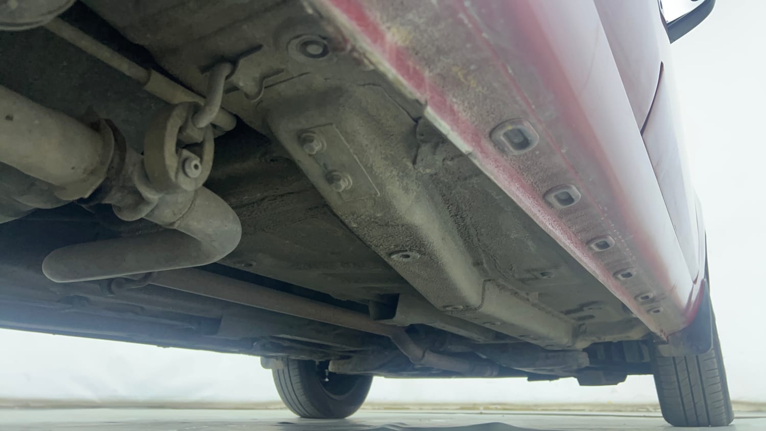 Used 2015 Tata Zest XMS Petrol Petrol Manual extra REAR RIGHT UNDERBODY VIEW