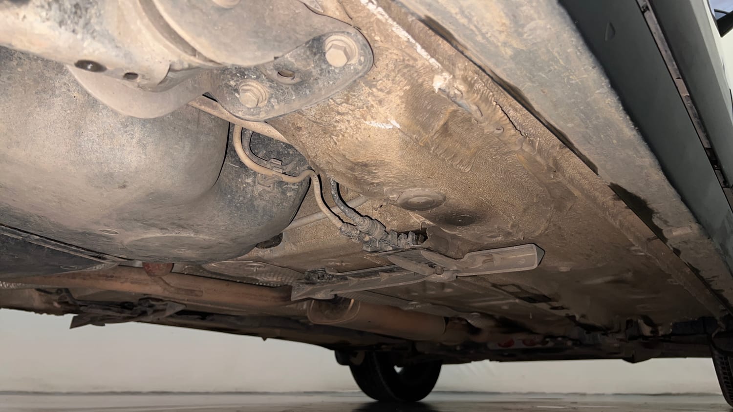 Used 2023 Volkswagen Taigun Topline 1.0 TSI AT Petrol Automatic extra REAR RIGHT UNDERBODY VIEW