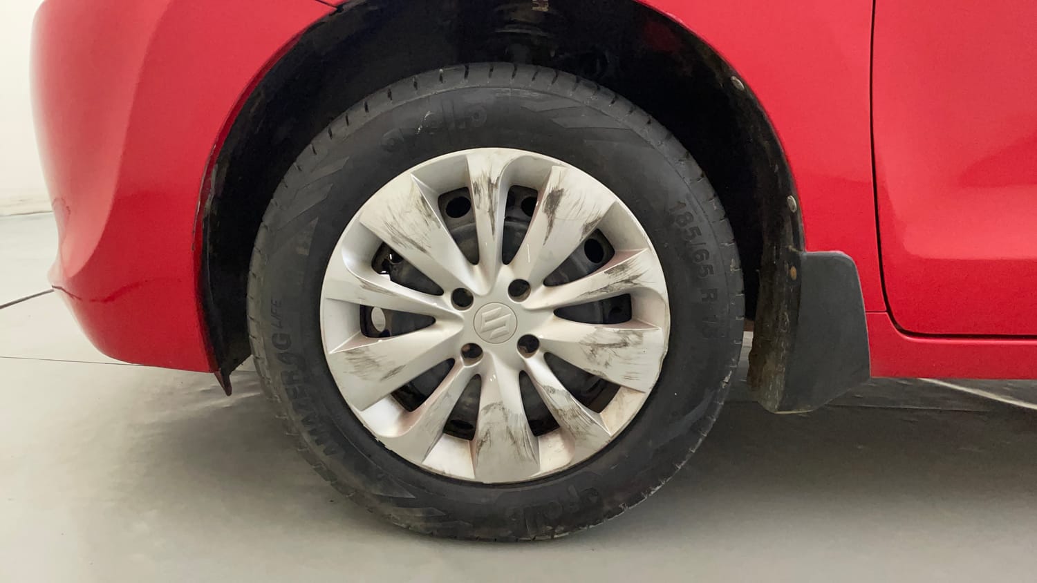 Used 2018 Maruti Suzuki Baleno Delta 1.2 Petrol Manual tyres LEFT FRONT TYRE RIM VIEW