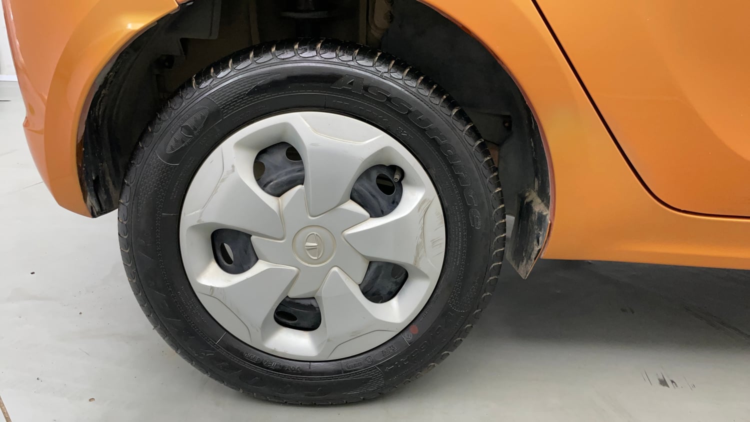 Used 2016 Tata Tiago Revotron XT Petrol Manual tyres RIGHT REAR TYRE RIM VIEW
