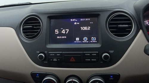 Used 2018 Hyundai Grand i10 Sportz 1.2 Kappa VTVT Petrol Manual top_features Integrated (in-dash) music system