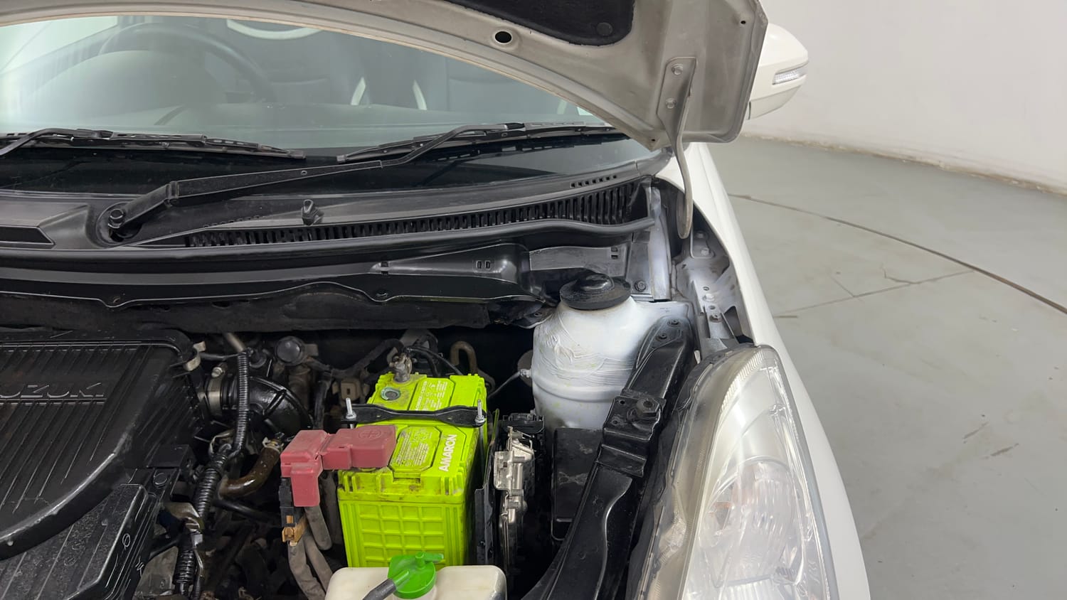 Used 2013 Maruti Suzuki Swift VXi Petrol Manual engine ENGINE LEFT SIDE HINGE & APRON VIEW