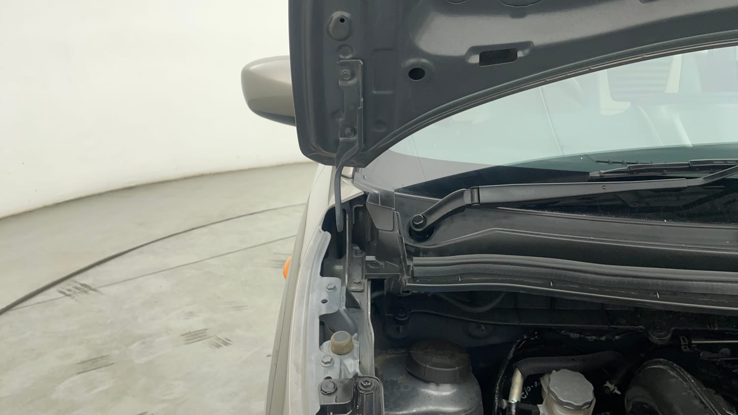 Used 2024 Maruti Suzuki Wagon R VXI 1.0 AGS Petrol Automatic engine ENGINE RIGHT SIDE HINGE & APRON VIEW