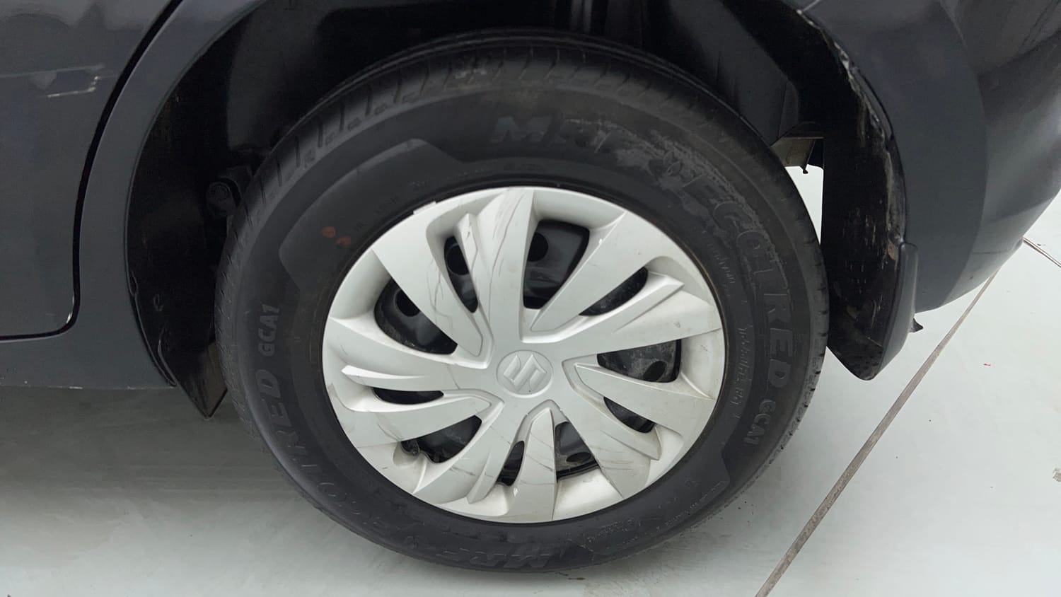 Used 2025 Maruti Suzuki Swift VXi AMT Petrol Automatic tyres LEFT REAR TYRE RIM VIEW