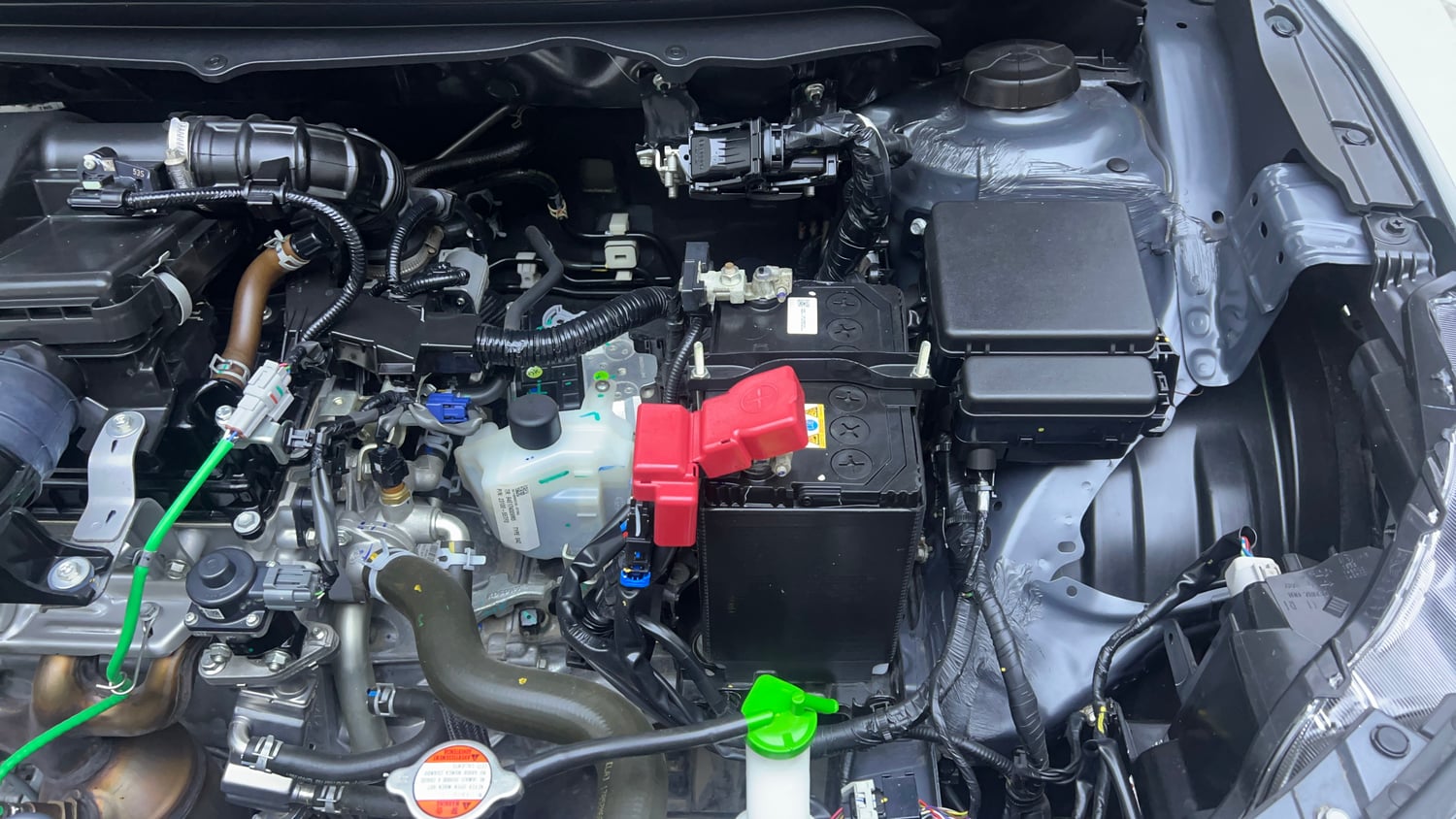 Used 2024 Maruti Suzuki Baleno Zeta AGS Petrol Automatic engine ENGINE LEFT SIDE VIEW