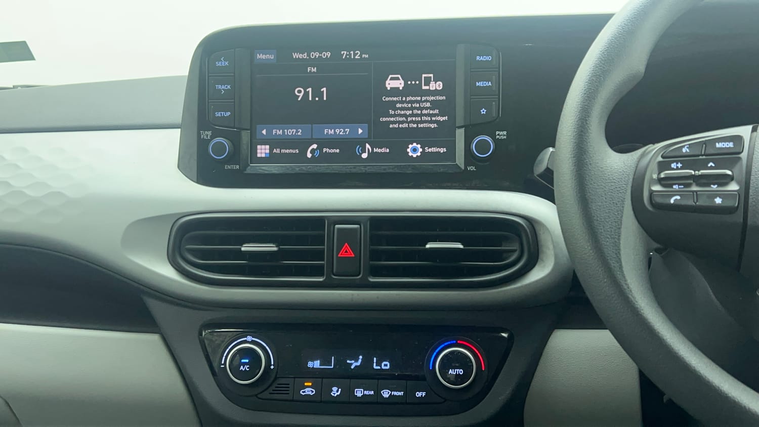 Used 2023 Hyundai Grand i10 Nios Sportz 1.2 Kappa VTVT Petrol Manual top_features Integrated (in-dash) music system