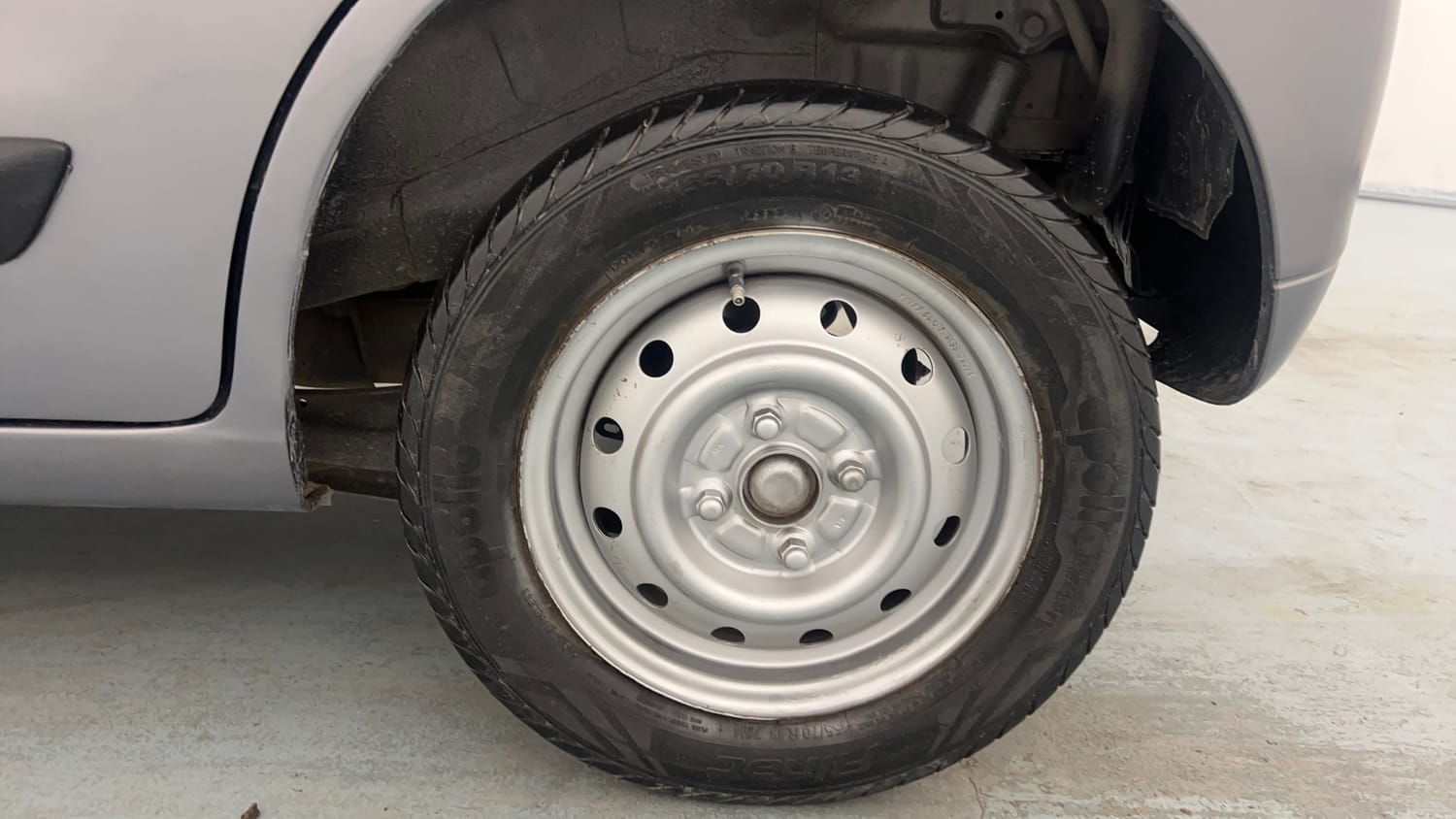 Used 2014 Maruti Suzuki Wagon R LXI Petrol Manual tyres LEFT REAR TYRE RIM VIEW