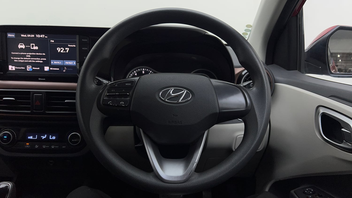Used 2022 Hyundai Aura SX Plus 1.2 AMT Petrol Petrol Automatic interior STEERING VIEW