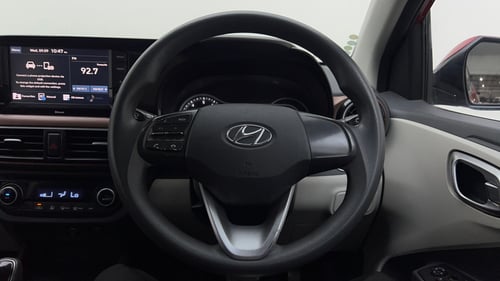 Used 2022 Hyundai Aura SX Plus 1.2 AMT Petrol Petrol Automatic interior STEERING VIEW