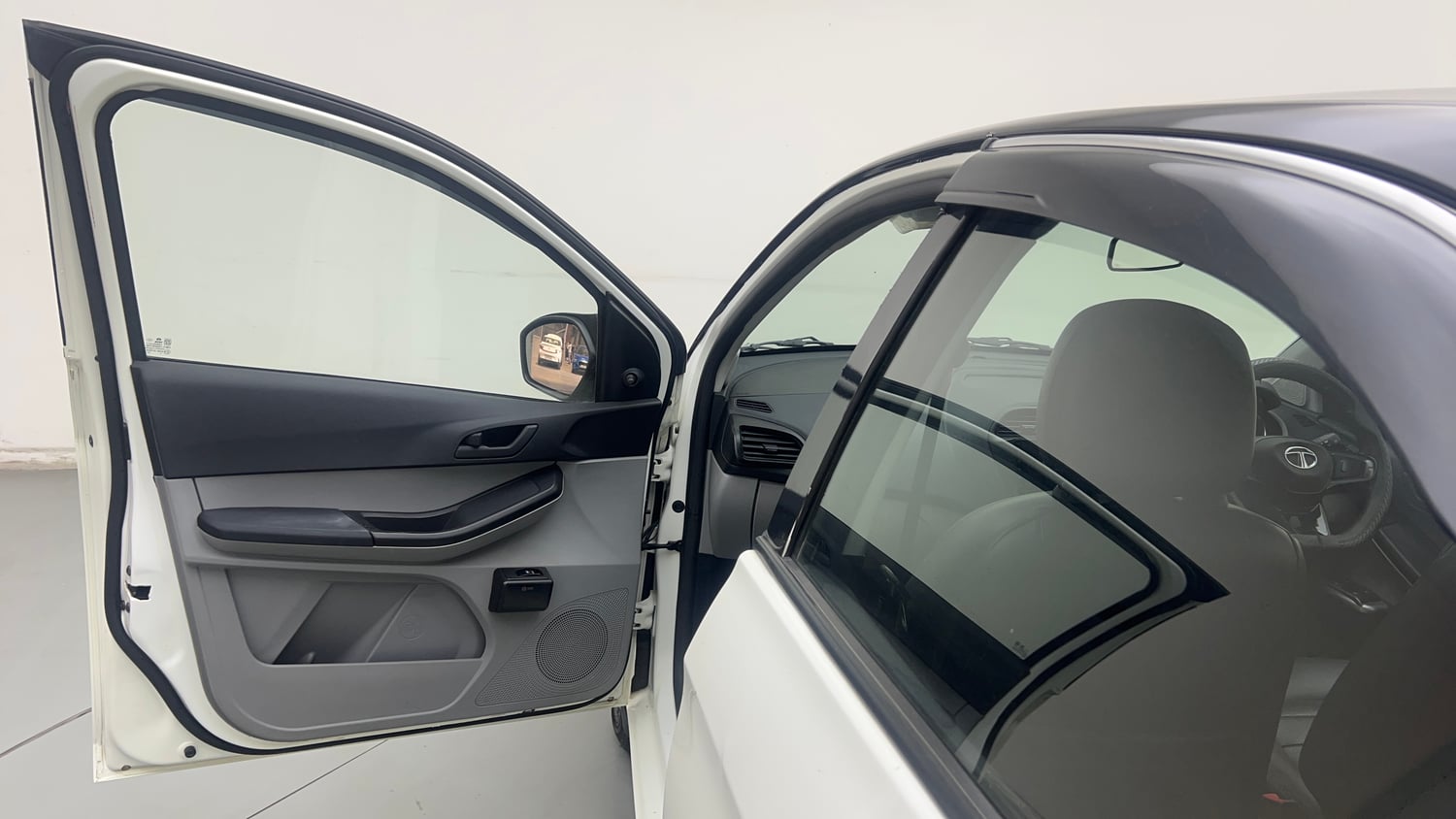 Used 2023 Tata Tiago XE Petrol Manual interior LEFT FRONT DOOR OPEN VIEW