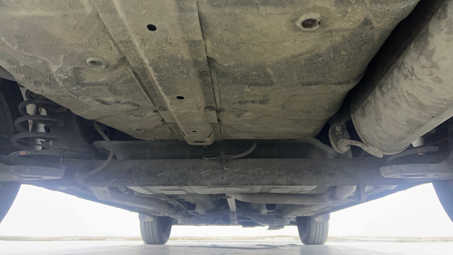 Used 2015 Tata Zest XMS Petrol Petrol Manual extra REAR UNDERBODY VIEW (TAKEN FROM REAR)