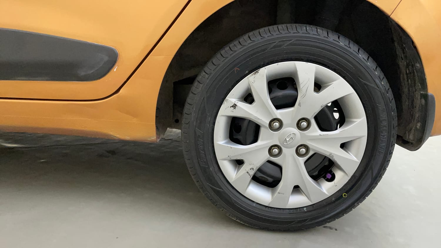 Used 2015 Hyundai Grand i10 Sportz 1.2 Kappa VTVT Petrol Manual tyres LEFT REAR TYRE RIM VIEW