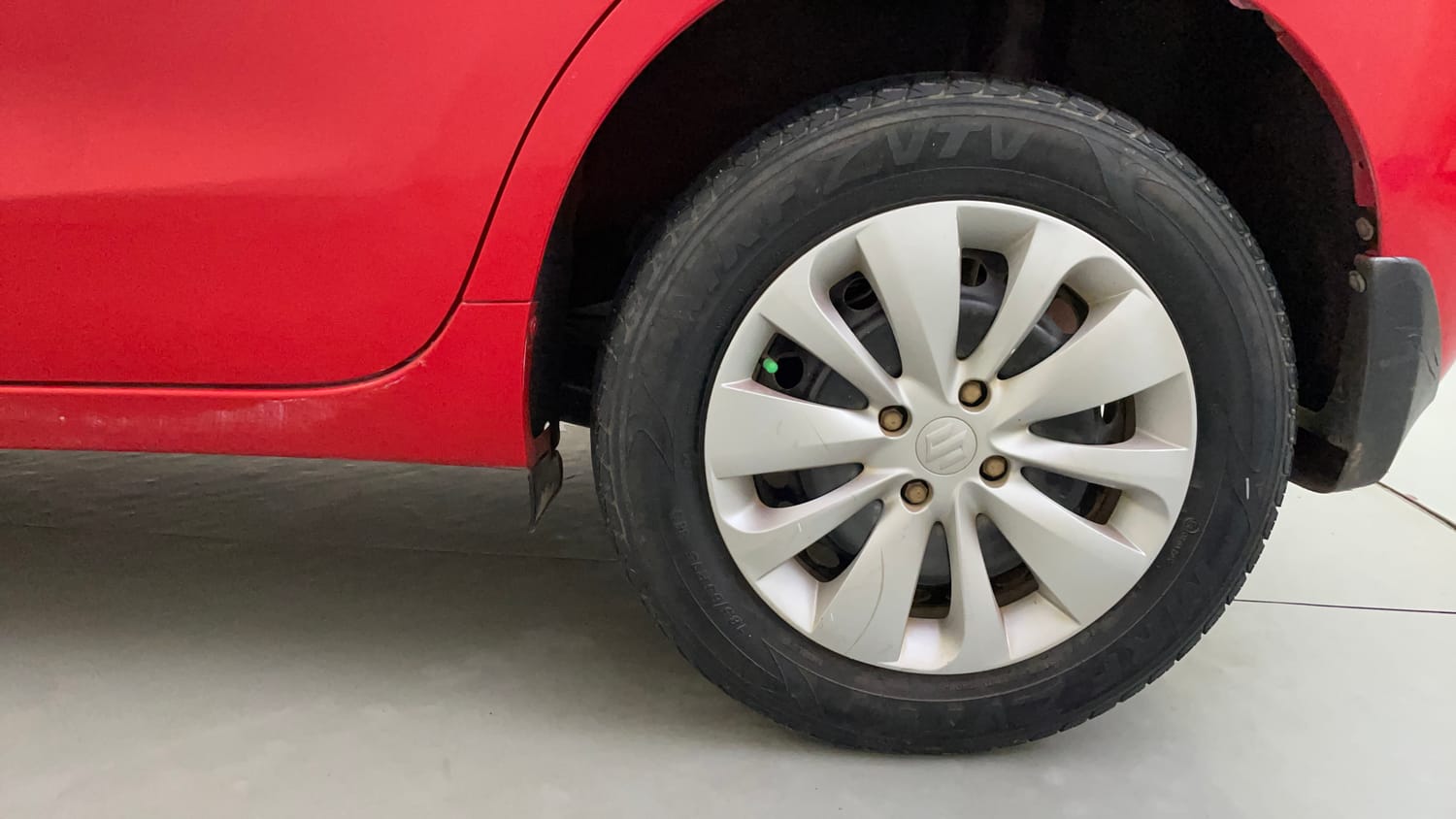 Used 2018 Maruti Suzuki Baleno Delta 1.2 Petrol Manual tyres LEFT REAR TYRE RIM VIEW