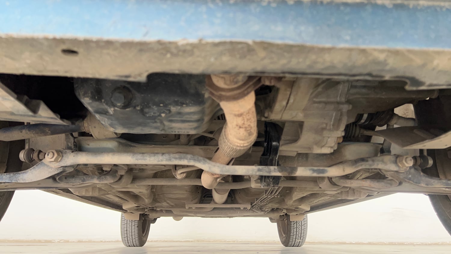 Used 2017 Tata Tiago Revotron XT Petrol Manual extra FRONT LEFT UNDERBODY VIEW