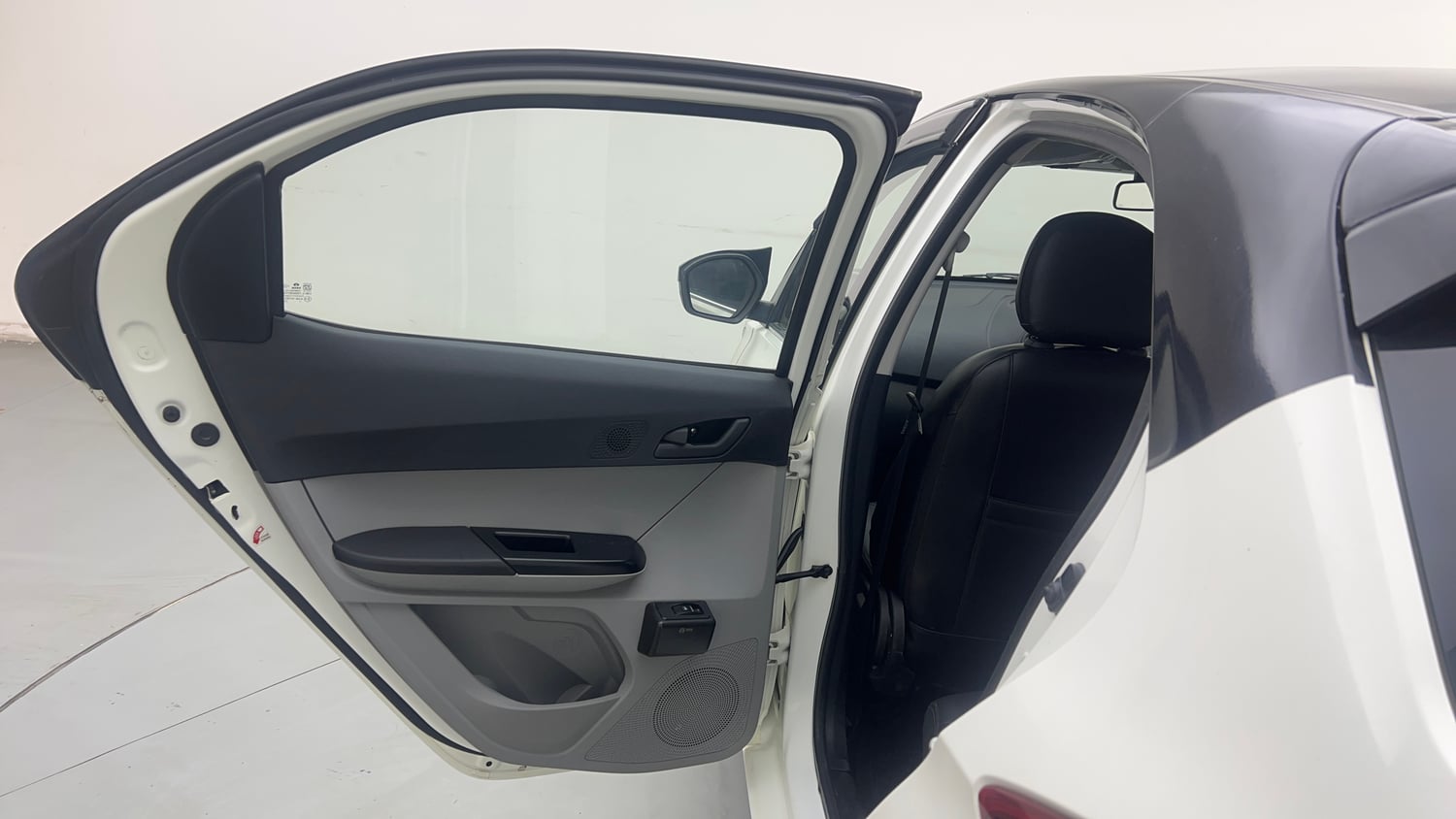 Used 2023 Tata Tiago XE Petrol Manual interior LEFT REAR DOOR OPEN VIEW
