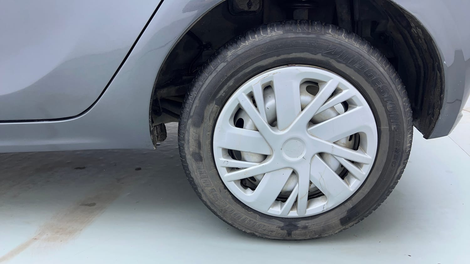 Used 2022 Tata Tiago XE Petrol Manual tyres LEFT REAR TYRE RIM VIEW