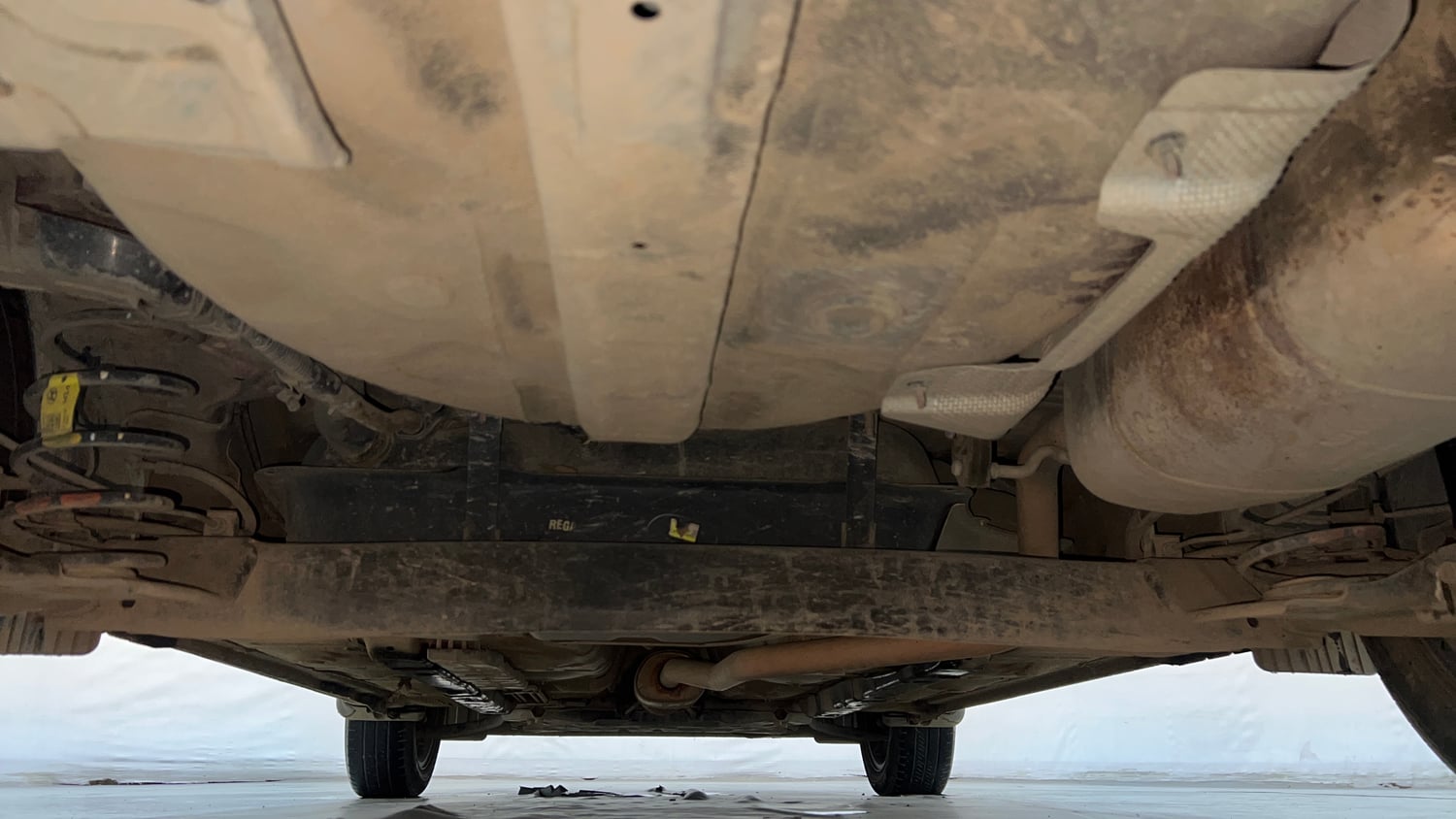 Used 2022 Hyundai Aura SX Plus 1.2 AMT Petrol Petrol Automatic extra REAR UNDERBODY VIEW (TAKEN FROM REAR)