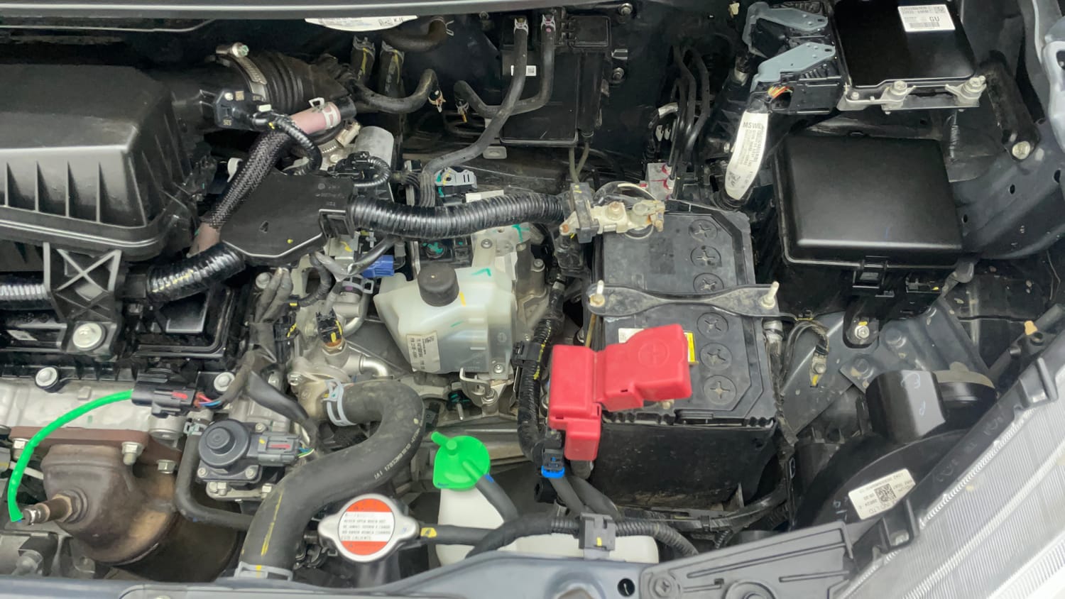 Used 2024 Maruti Suzuki Wagon R VXI 1.0 AGS Petrol Automatic engine ENGINE LEFT SIDE VIEW