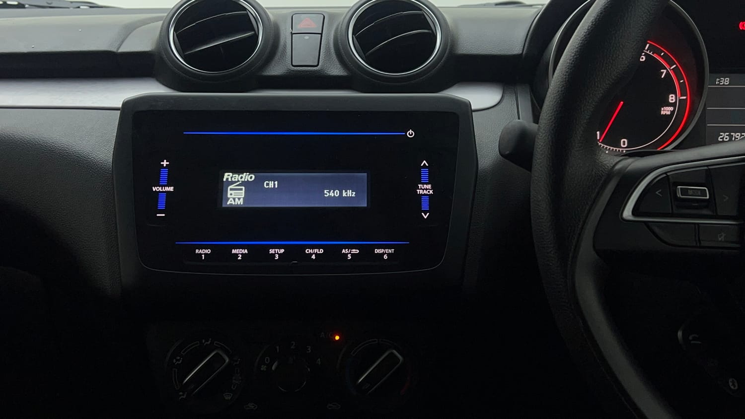 Used 2022 Maruti Suzuki Swift VXi Petrol Manual top_features Integrated (in-dash) music system