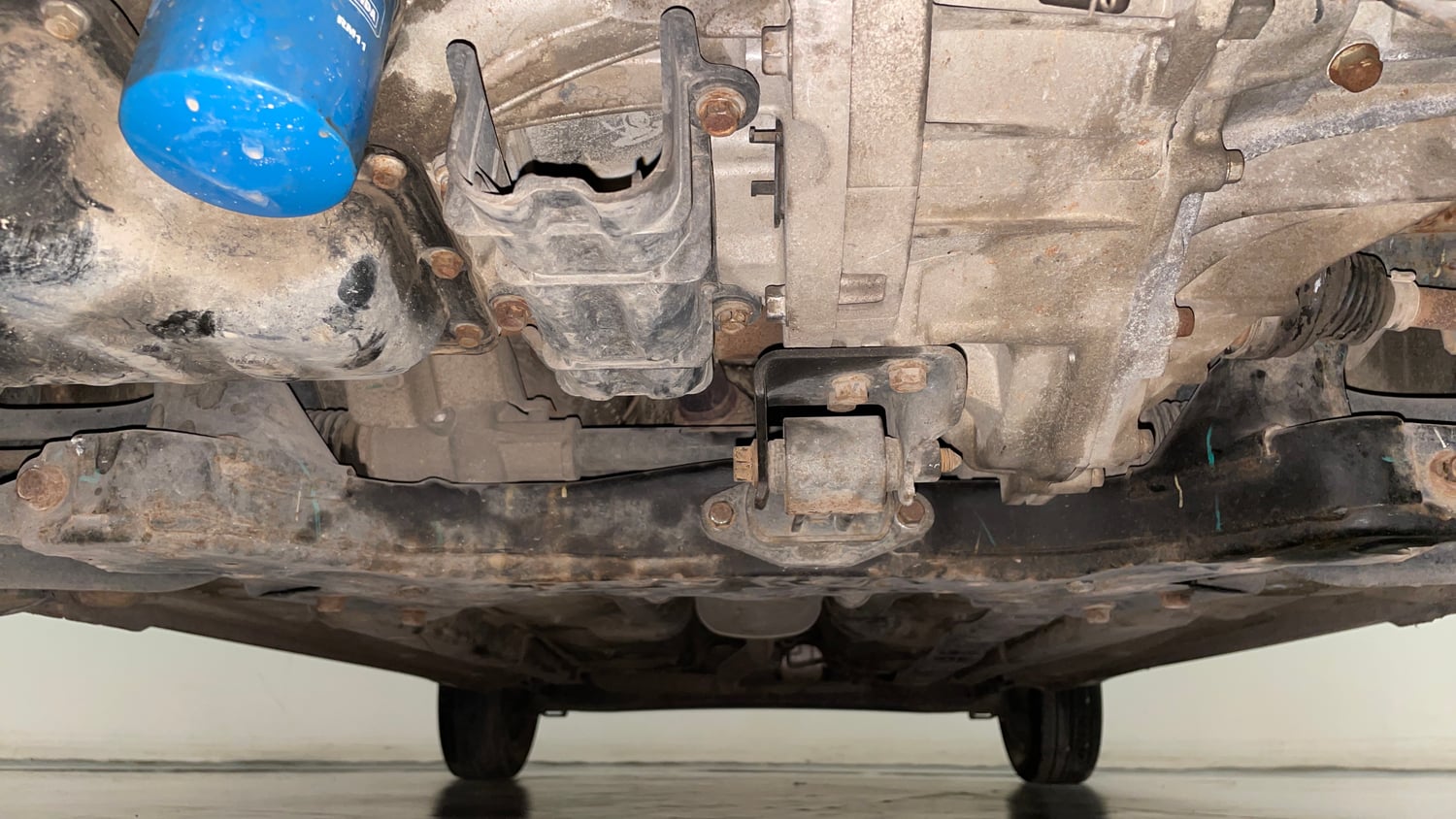 Used 2015 Hyundai Grand i10 Sportz 1.2 Kappa VTVT Petrol Manual extra FRONT LEFT UNDERBODY VIEW