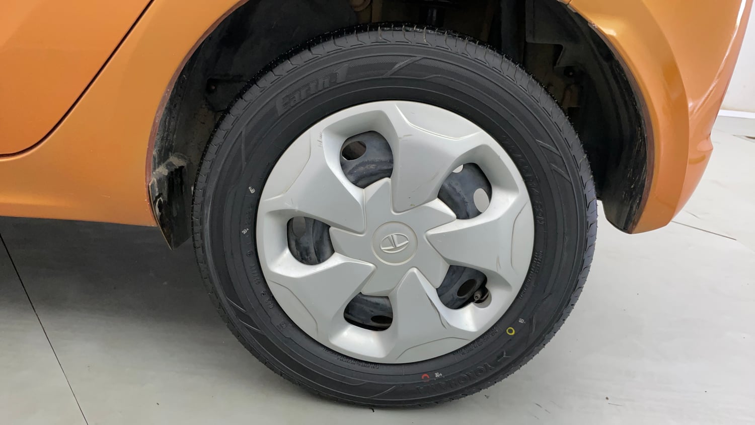 Used 2016 Tata Tiago Revotron XT Petrol Manual tyres LEFT REAR TYRE RIM VIEW