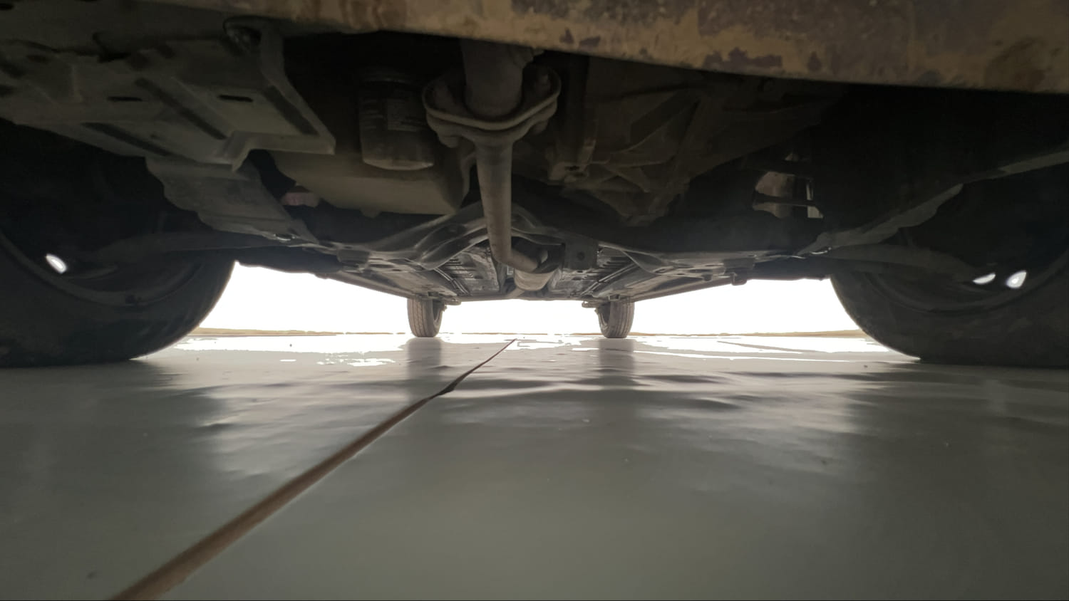 Used 2017 Maruti Suzuki Celerio VXi AMT Petrol Automatic extra FRONT LEFT UNDERBODY VIEW