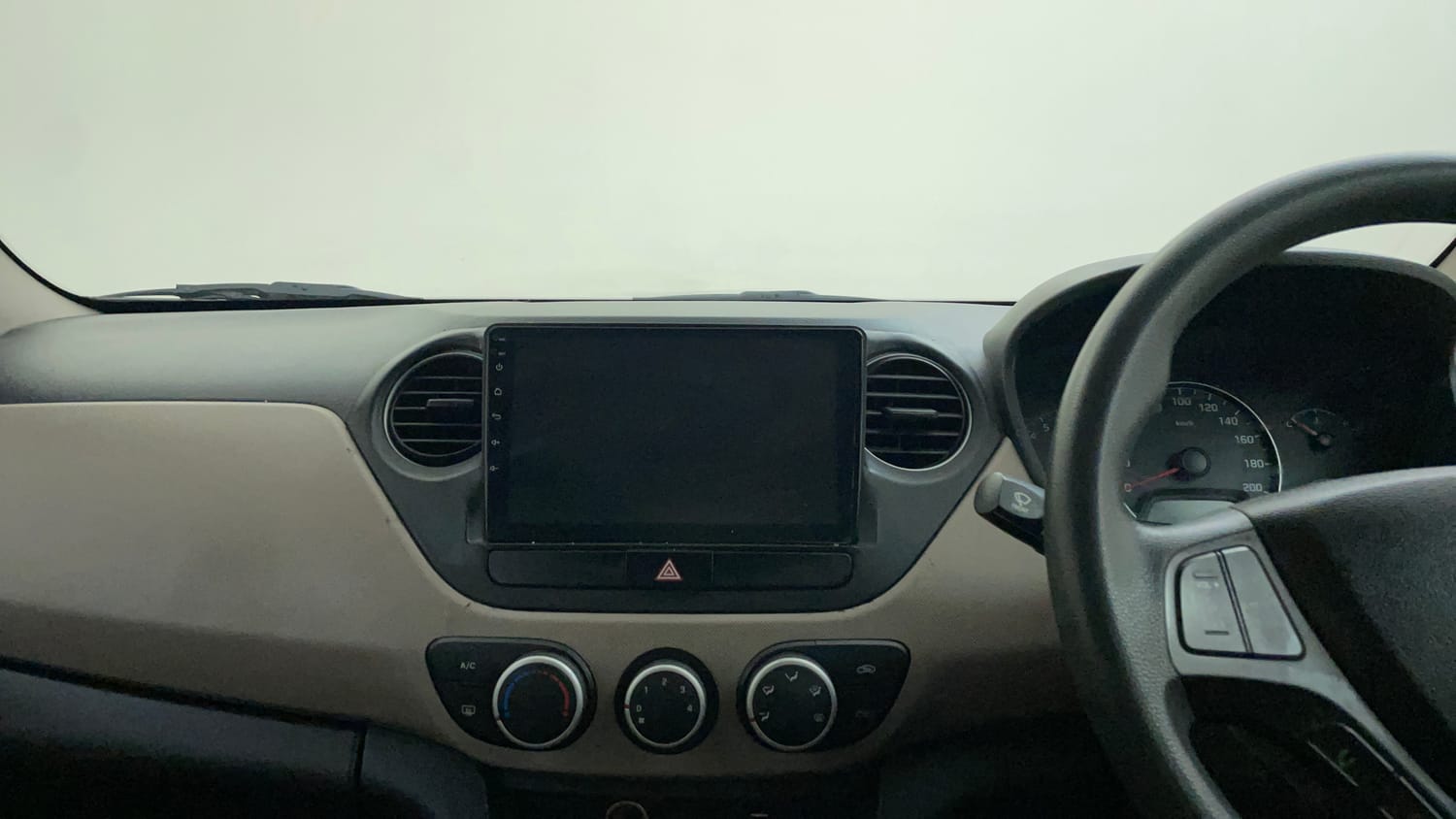 Used 2015 Hyundai Grand i10 Sportz 1.2 Kappa VTVT Petrol Manual interior MUSIC SYSTEM & AC CONTROL VIEW