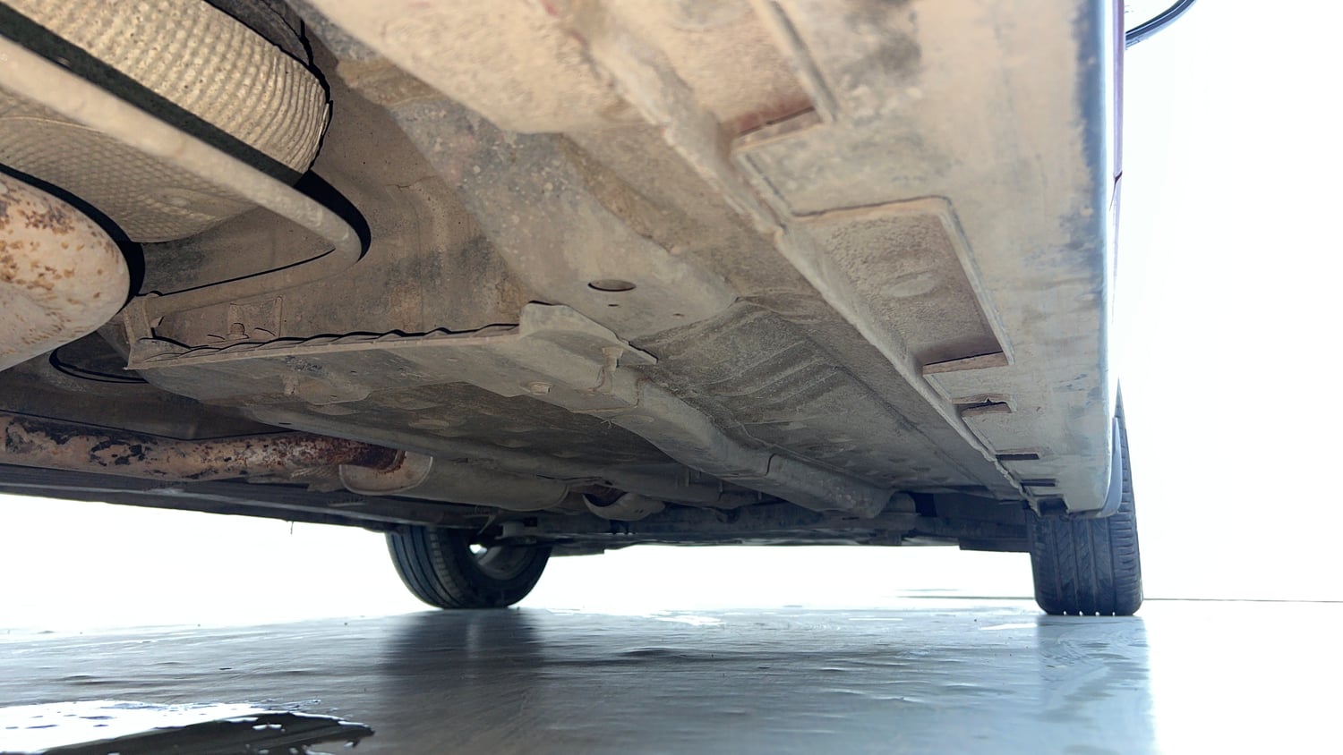 Used 2021 Hyundai New i20 Asta (O) 1.0 Turbo DCT Petrol Automatic extra REAR RIGHT UNDERBODY VIEW