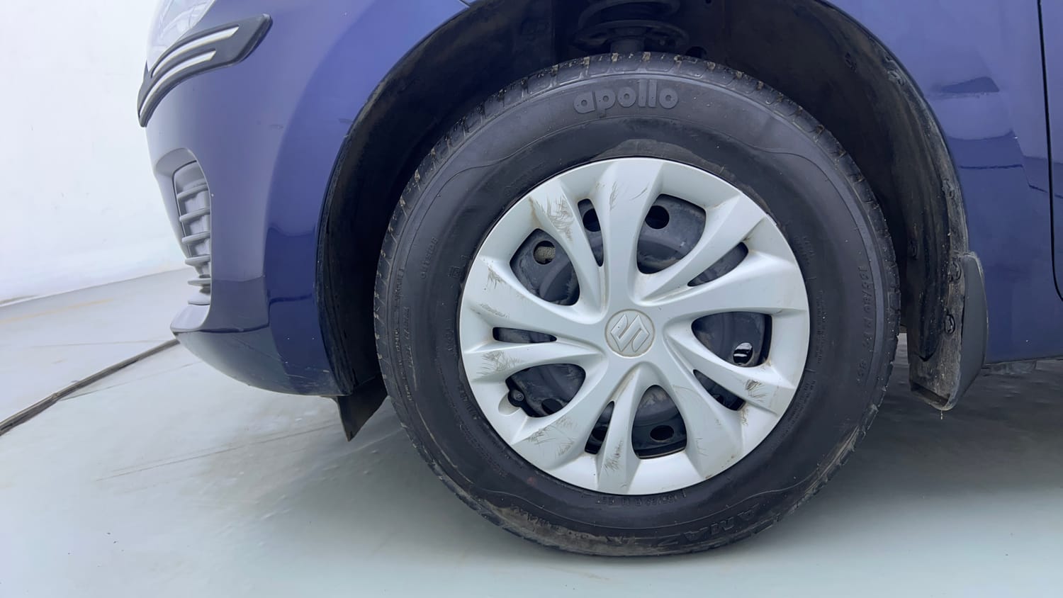 Used 2023 Maruti Suzuki Swift VXi AMT Petrol Automatic tyres LEFT FRONT TYRE RIM VIEW