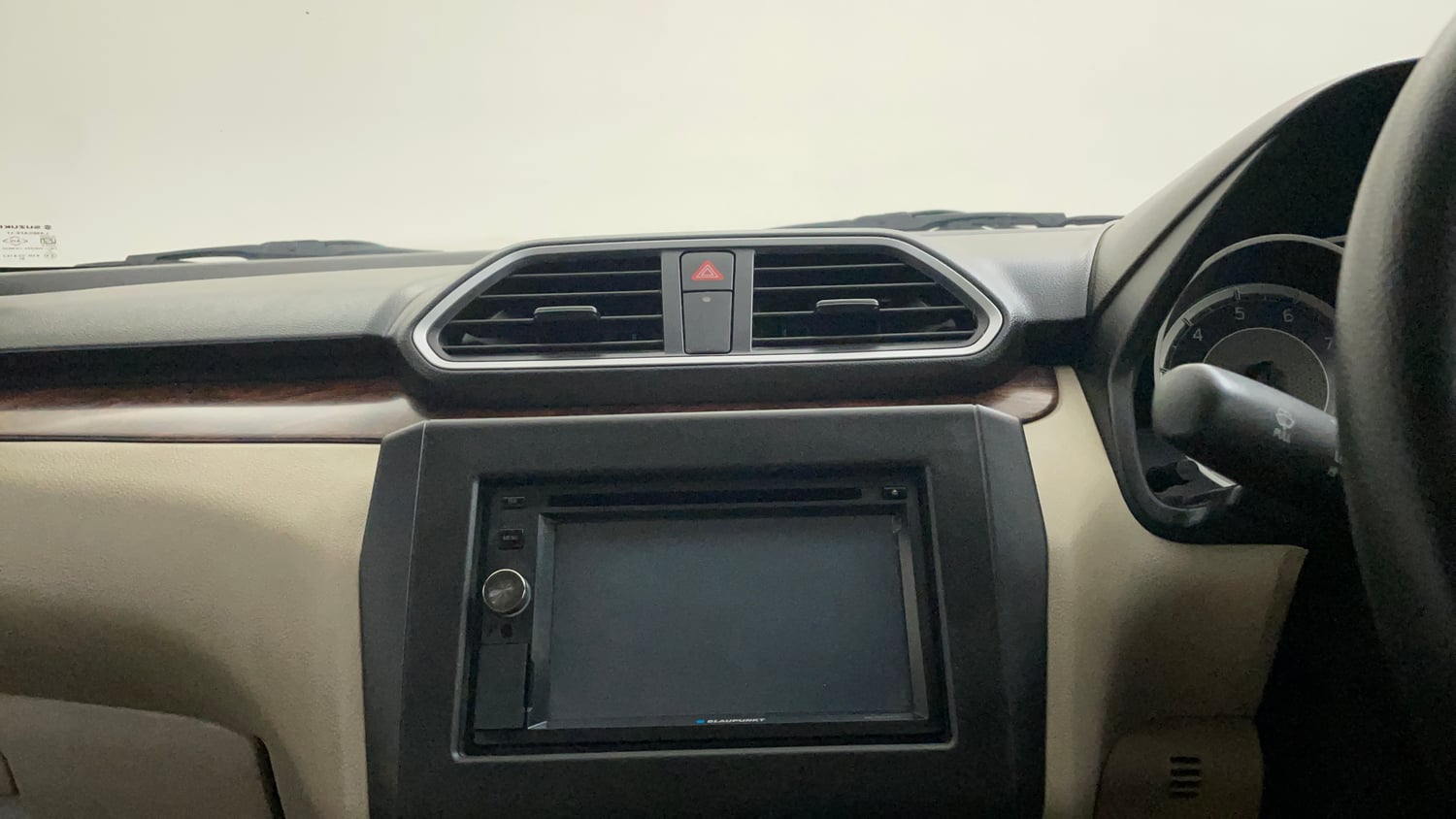 Used 2018 Maruti Suzuki Dzire VXi AMT Petrol Automatic top_features Integrated (in-dash) music system