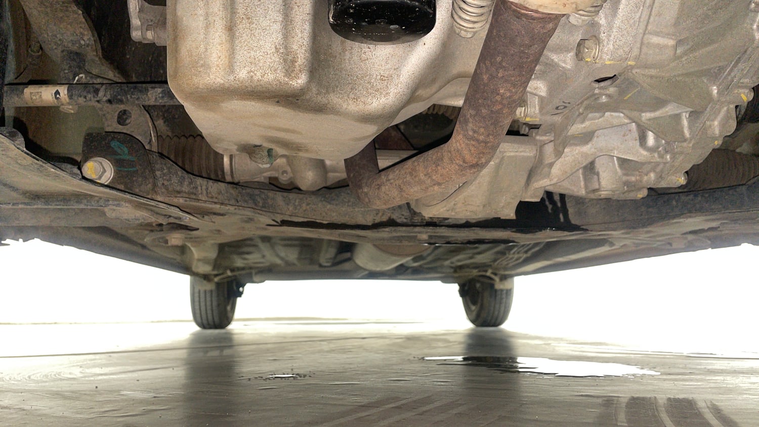 Used 2024 Maruti Suzuki Wagon R VXI 1.0 AGS Petrol Automatic extra FRONT LEFT UNDERBODY VIEW