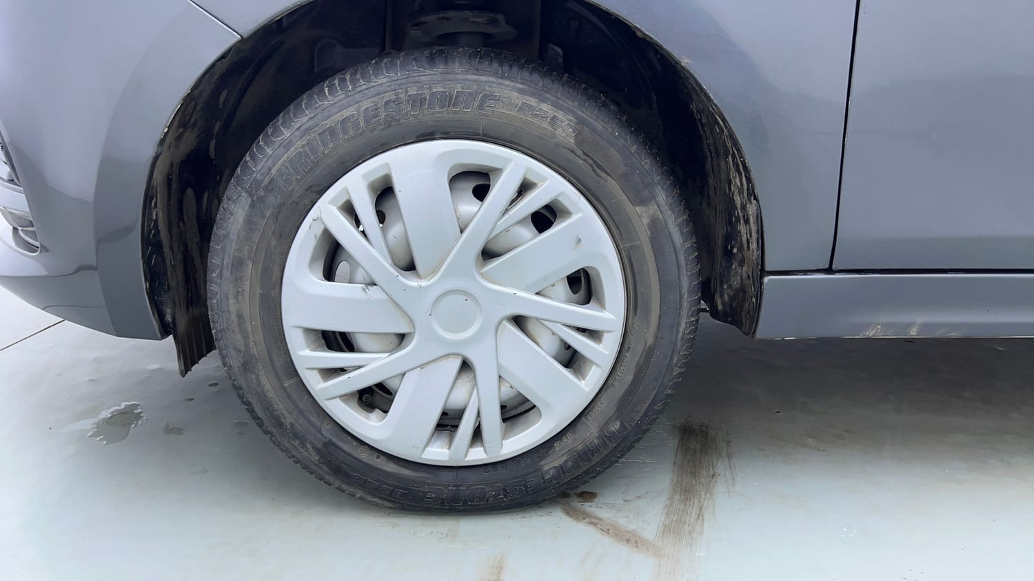 Used 2022 Tata Tiago XE Petrol Manual tyres LEFT FRONT TYRE RIM VIEW