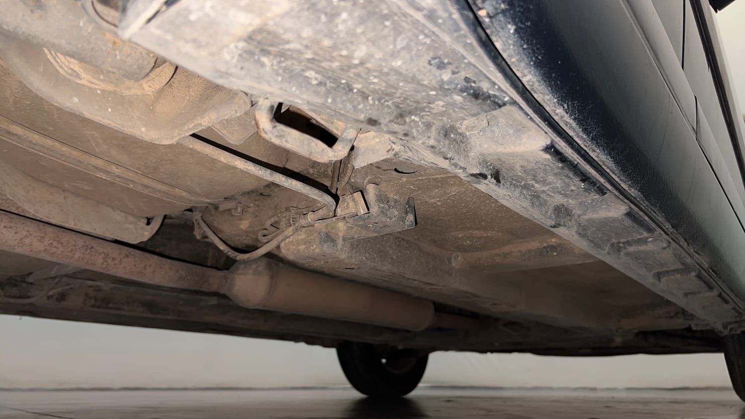 Used 2012 Maruti Suzuki Swift Dzire LXi 1.2 BS-IV Petrol Manual extra REAR RIGHT UNDERBODY VIEW