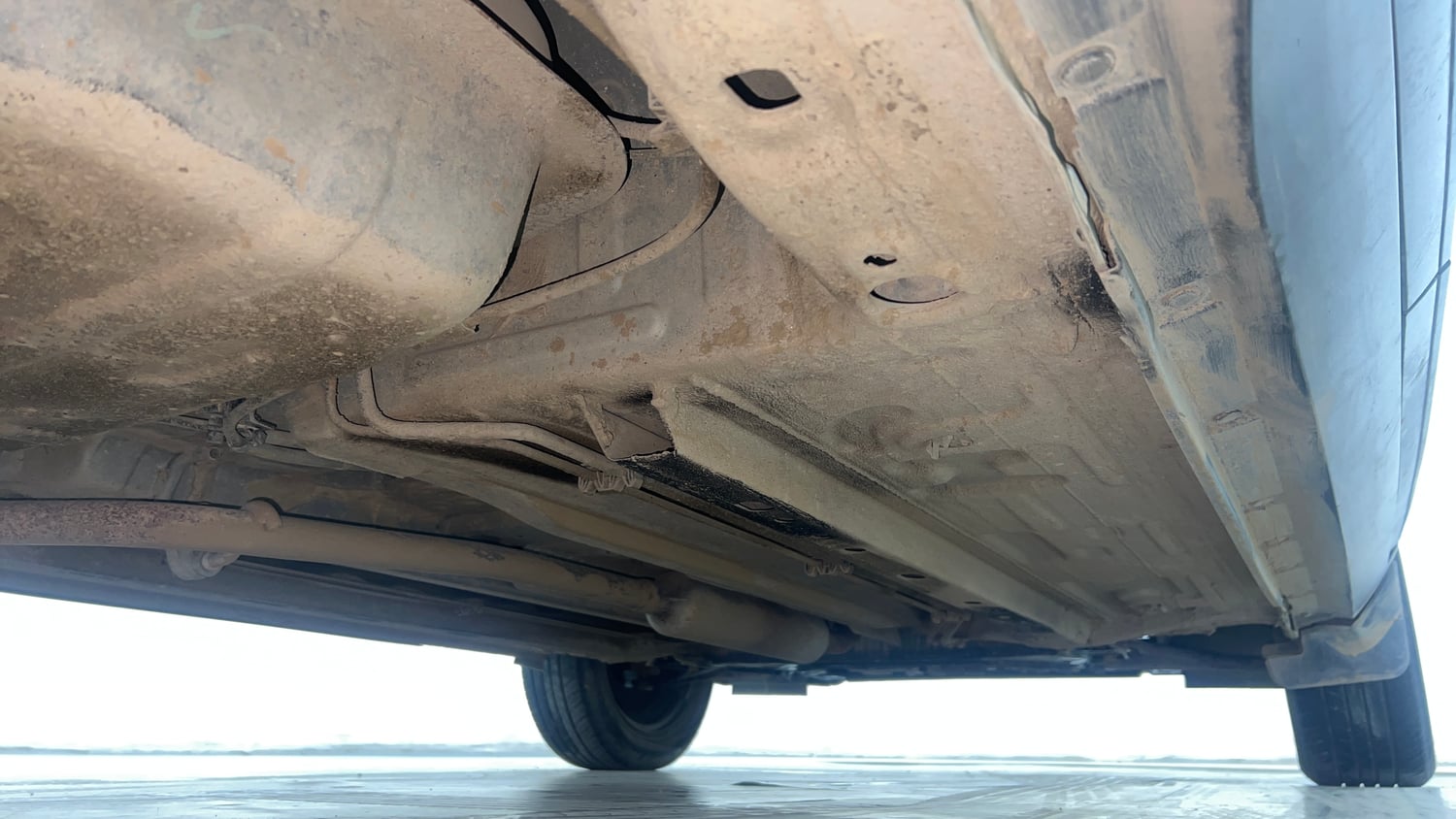 Used 2021 Nissan Magnite XE Petrol Manual extra REAR RIGHT UNDERBODY VIEW