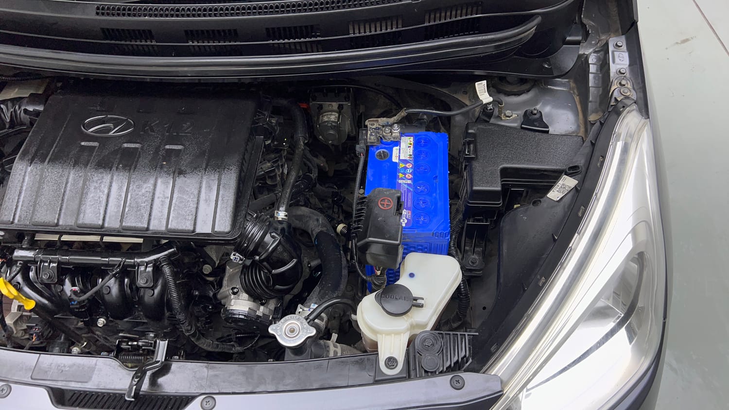 Used 2019 Hyundai Grand i10 Sportz 1.2 Kappa VTVT Petrol Manual engine ENGINE LEFT SIDE VIEW