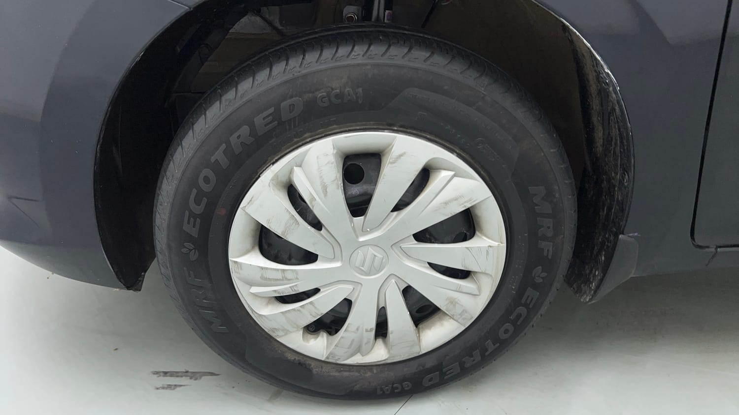 Used 2025 Maruti Suzuki Swift VXi AMT Petrol Automatic tyres LEFT FRONT TYRE RIM VIEW