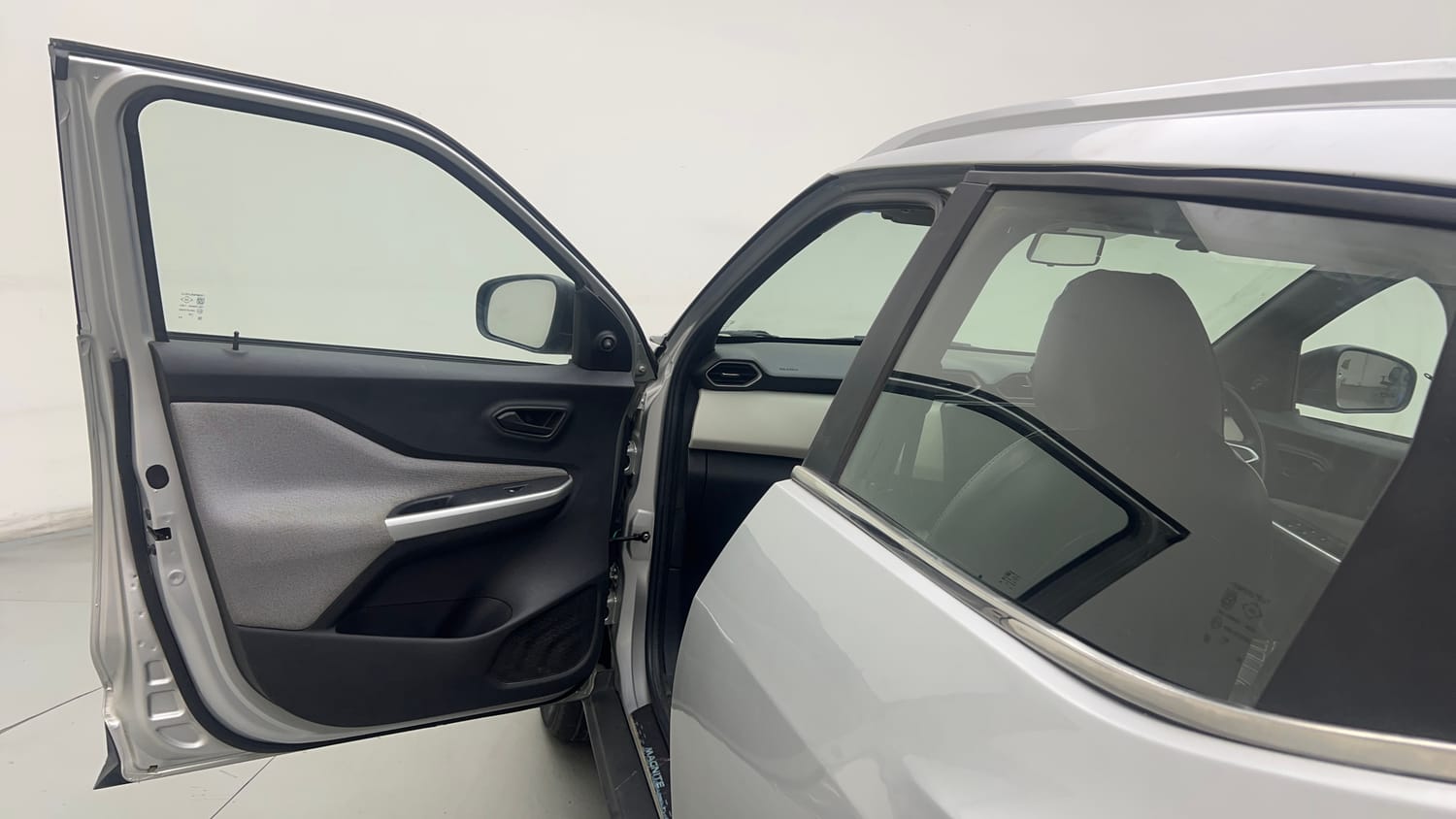 Used 2021 Nissan Magnite XE Petrol Manual interior LEFT FRONT DOOR OPEN VIEW