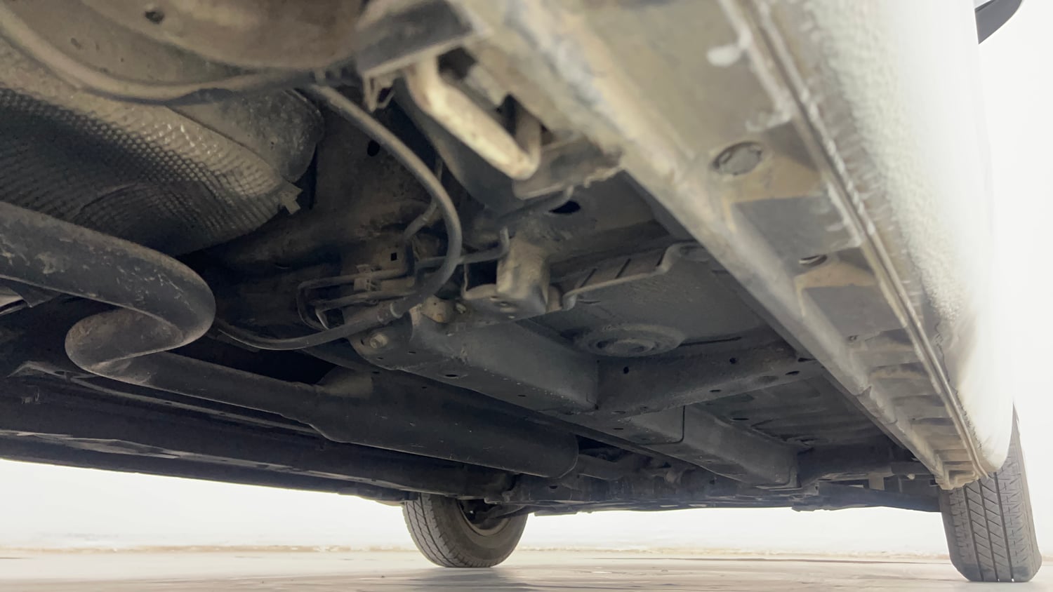 Used 2013 Maruti Suzuki Swift VXi Petrol Manual extra REAR RIGHT UNDERBODY VIEW