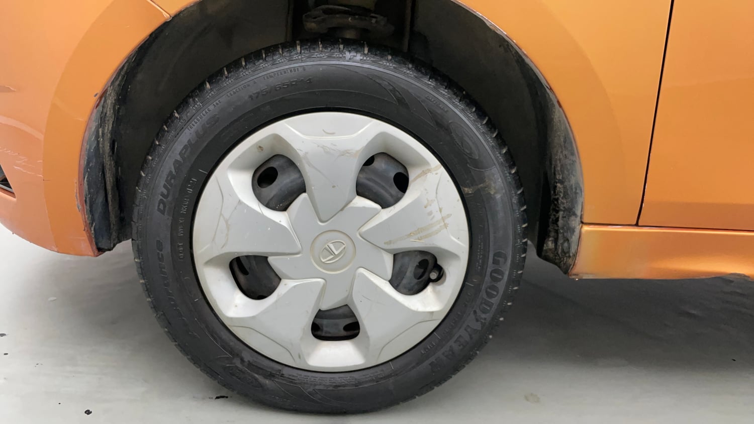 Used 2016 Tata Tiago Revotron XT Petrol Manual tyres LEFT FRONT TYRE RIM VIEW