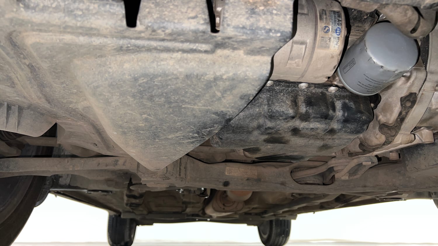Used 2023 Volkswagen Taigun Topline 1.0 TSI AT Petrol Automatic extra FRONT LEFT UNDERBODY VIEW